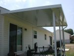 Flat Pan Patio Cover over a sliding door and windows