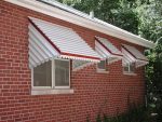 three Deluxe Window Awnings